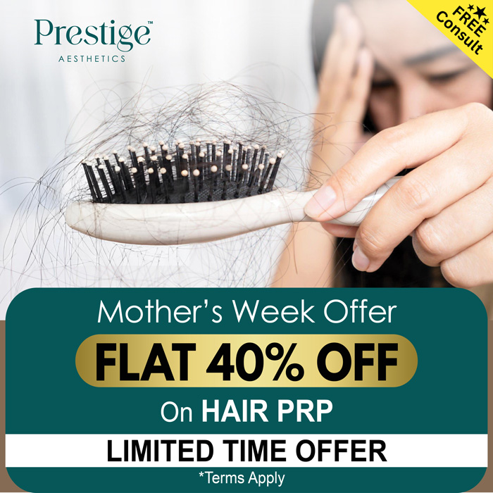 a woman holding a hair brush