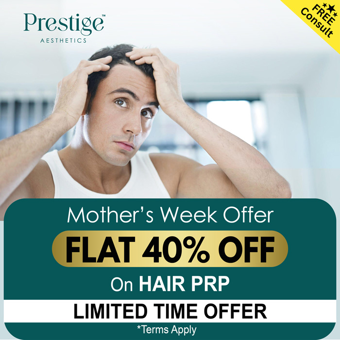 a man holding his head